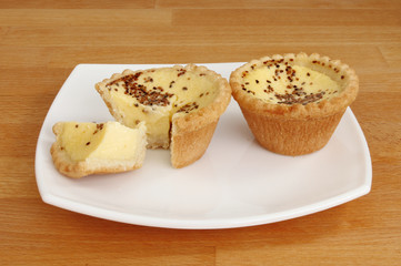 Egg custard tarts on a plate