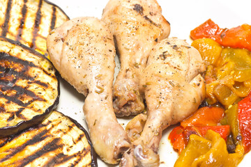 Roasted chicken thigh with grilled eggplant and peppers