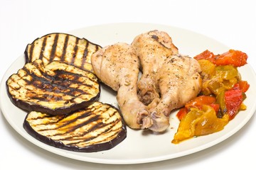 Roasted chicken thigh with grilled eggplant and peppers
