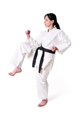 Karate woman posing on a white background