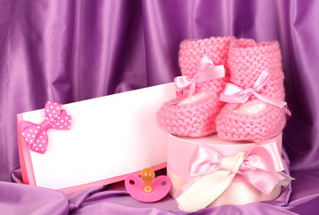 pink baby boots, pacifierd, postcard and gifts