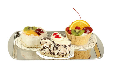 sweet cakes with fruits and chocolate