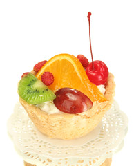 sweet cake with fruits isolated on white