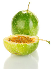 green passion fruit isolated on white background close-up