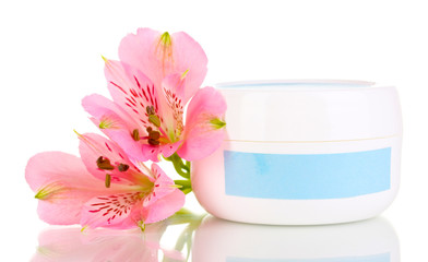 Jar of cream with flower isolated on white