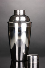 Cocktail shaker on grey background