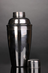 Cocktail shaker on grey background