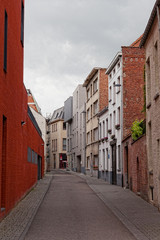 Fototapeta na wymiar ancient narrow street in the Belgian city of Malines (Mechelen)