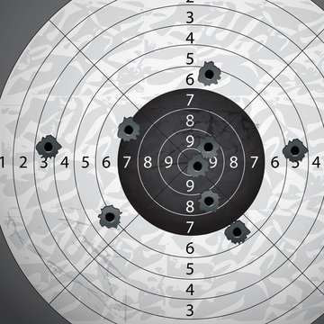 Gun bullet`s holes on paper target