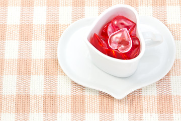Red and pink heart and heart shaped coffee cup
