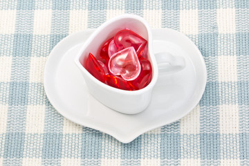 Red and pink heart and heart shaped coffee cup