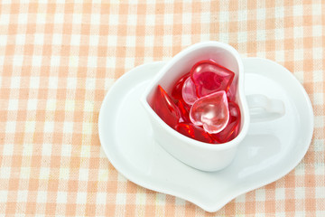 Red and pink heart and heart shaped coffee cup