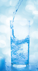 glass of water being poured