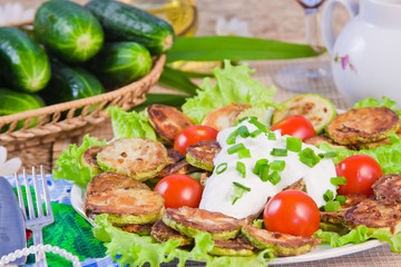 baked vegetable marrows with tomatoes and fresh cucumbers