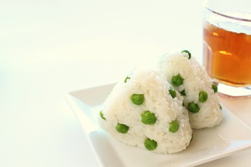 Japanese cuisine rice ball Onigiri with green-peas