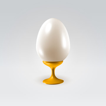 Shining pearl egg on a golden handle