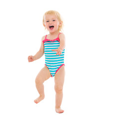 Portrait of cheerful baby in swimsuit