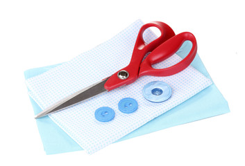 Sewing accessories and fabric isolated on white