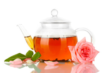 teapot of tea with rose isolated on white