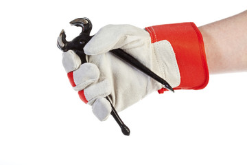 Hand with protection glove holding pincer