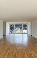 New apartment, interior, empty room with large window. Nobody inside.