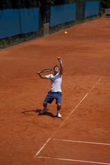 tennis player at the service