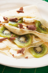 Crepes with kiwi fruit and banana