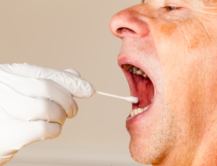 DNA swab of saliva taken from senior man