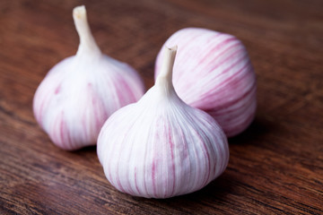 Garlic on wooden  brown background