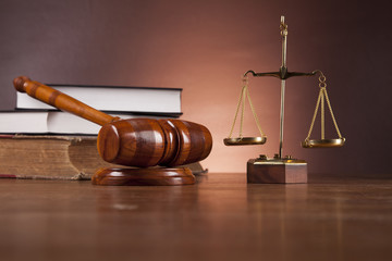 Justice concept with gavel on dark background
