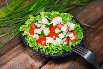 fresh salad with tomato and cucumber
