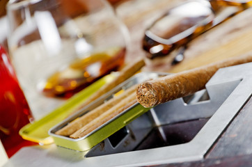 still life with cognac and cigars