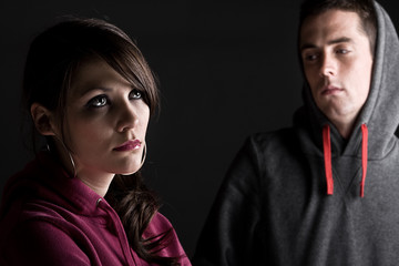Teenagers against Dark Background