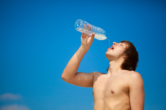 A Man Is Drinking Water