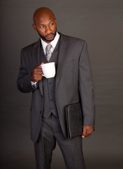 Young Black Business Man with coffee mug