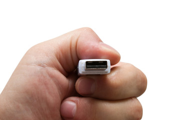USB flash drive in hand on white background