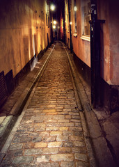 Fototapeta na wymiar Narrow street in Stockholm at night