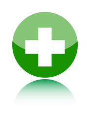 First aid medical sign on green