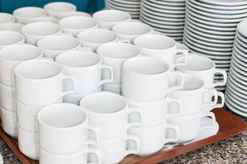 Fototapeta na wymiar Catering. saucers, and cups of tea.