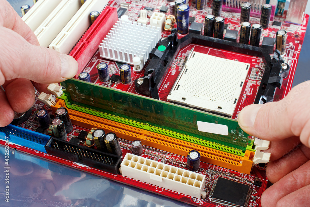 Wall mural installing ram module to computer motherboard