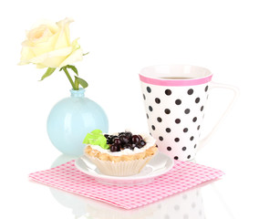 sweet cake with cup of tea isolated on white