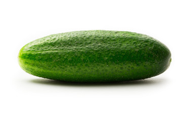 Fresh green cucumbers on white