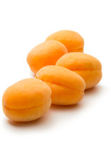 Fototapeta na wymiar Ripe apricots on white background