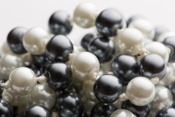String of black and white pearls