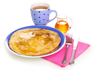 Stack of tasty pancakes isolated on white