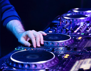 Obraz premium Dj mixes the track