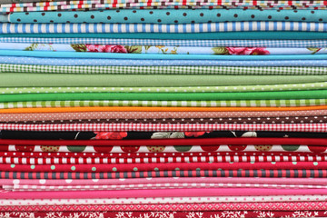 Pile of colorful cotton textile  background
