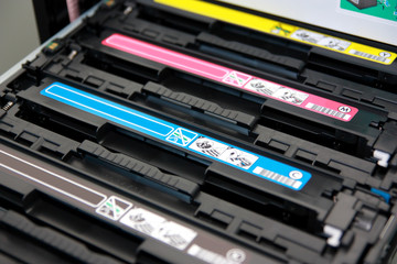 Cartridges of color laser multifunction printer - obrazy, fototapety, plakaty