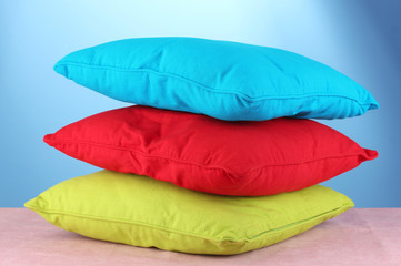 pillows on blue background