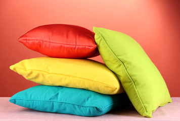 pillows on red background